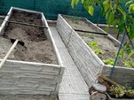 Betónové vyvýšené záhony a kompostéry